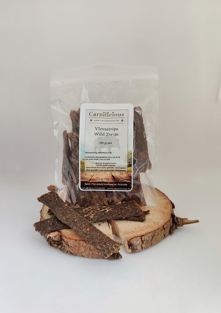 Carnilicious Vleesstrips Wild Zwijn zijn 100% natuurlijke, graan- en glutenvrije hondensnacks uit België van puur wild zwijnenvlees zonder kunstmatige toevoegingen. Licht verteerbaar en rijk aan eiwitten, ideaal als gezonde tussendoortjes of beloning voor alle hondenrassen, ook bij gevoelige magen. Stevig en compact formaat voor dagelijks snackplezier. Dog - Expert webshop voor gespecialiseerd hondenmateriaal,
